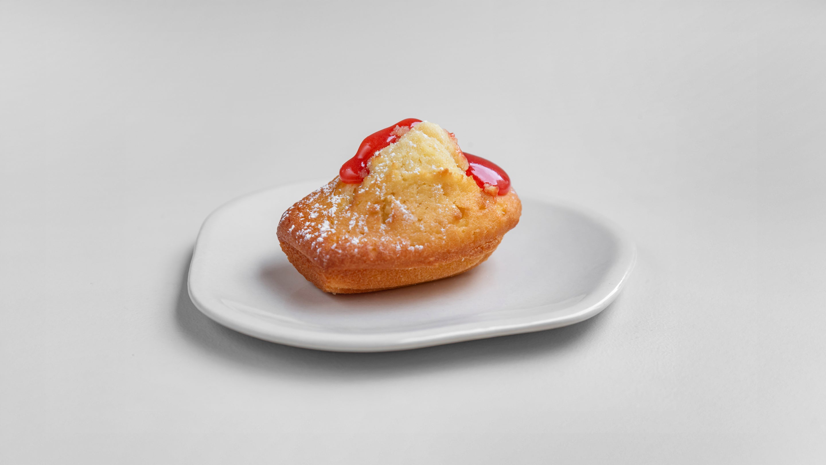 Madeleine avec coulis 